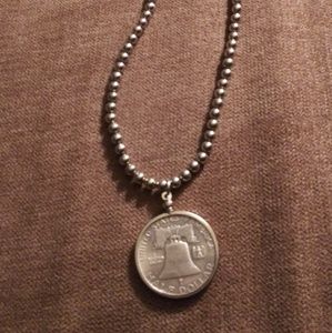 Silver half dollar pendant and sterling silver nec